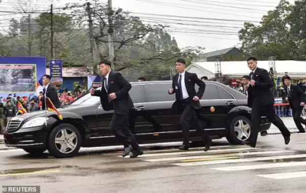 See Dozens Of Bodyguards Surrounding Kim Jong Un